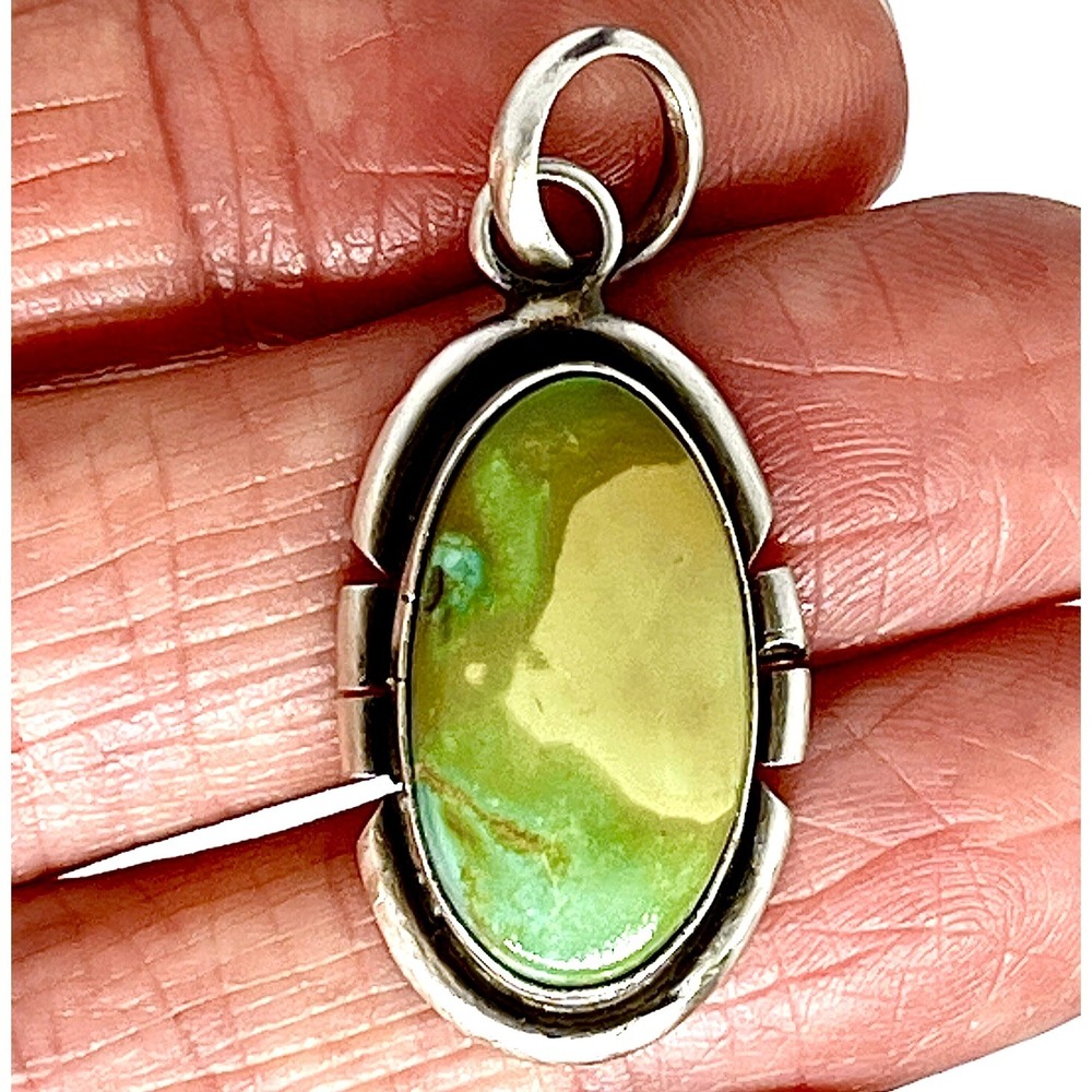 Navajo Turquoise Pendant 1.5 in Skeets Oval Sterling Matte Patina Royston